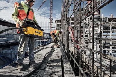 The vibrator can be activated remotely through DEWALT Wireless Tool Control and carried with an over-body hi-vis harness for transport.