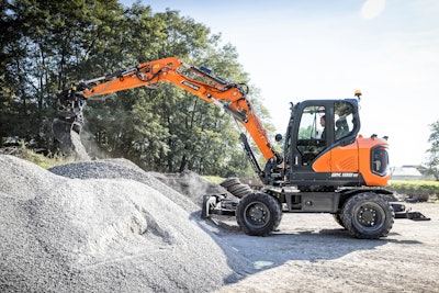 The DX100W-7 is equipped with steering, power and work modes to help operators customize their performance to move and work within confined spaces.