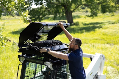 Compatible with select Bobcat R Series and John Deere models, the cooling system mounts to the roof of skid-steers and CTLs.