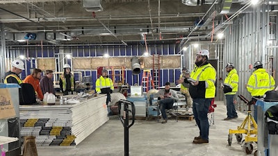 Paul Lawson, Risk Management Coordinator & Lead Mental Health Advocate For Mid-City Electric/Technologies in Columbus, Ohio, visits a jobsite during Mental Health Awareness Month.