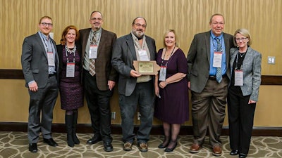 Max Bowman was presented the 2021 Build Iowa Award by Master Builders of Iowa. From left to right, Remington Lawyer (3rd Generation), Mary Lawyer, Bruce Bowman, Brad Bowman, Lois Bowman, Brett Bowman (Retired September 2023), and Vicki Bowman accepted the award.