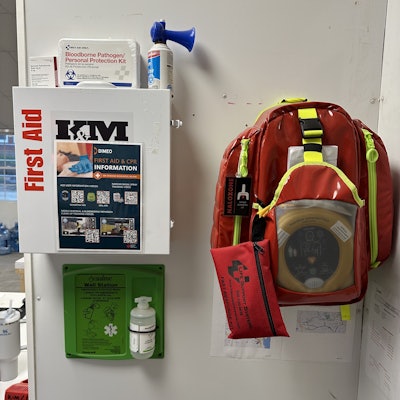 A mounted medical response backpack and first aid kit.