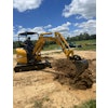 Designed for work in tight spaces, the machine is powered by a 23.6-hp Kubota engine and comes equipped with an 18-in. bucket.