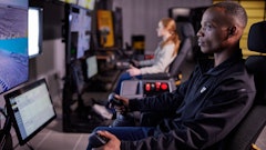 Remote control is also used when performing grading operations under Stage 3 conditions. In this instance, the operator is not on board the vehicle but operating it from a separate location using a joystick or belly box.
