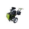 Powered by a 27-hp electric start gasoline engine, the machine features a single piece drum design with cutouts on each side of the housing for access.