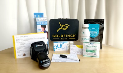 A 'Prepared for Surgery Kit' from Goldfinch Health includes pre-surgery drink, vibration therapy device, pain medication chart, chewing gum, probiotics, and a plant-based drug deactivation system pouch.