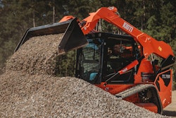 Powered by a 74-hp diesel engine, the machine offers two-speed travel, pilot hydraulic joystick controls, rearview camera, sliding overhead door and LED work lights.