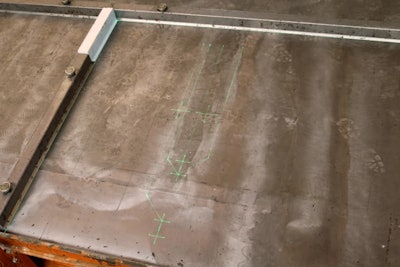 The laser project system can be permanently installed above a table or mounted on rails for long tracks.