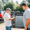 Takeuchi’s Moore employees signed the interior engine cover of the 10,000th CTL, making it a once-in-a-lifetime purchase.