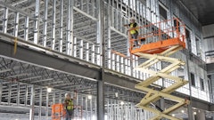 Updates to the JLG lines include standard AC drive motors, lithium-ion battery options and a range-extending genset charging option.