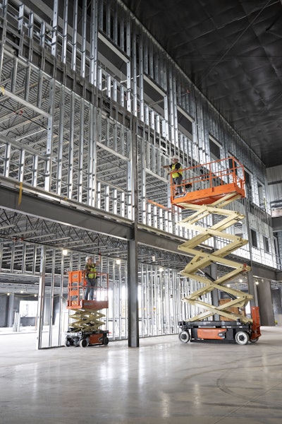 Updates to the JLG lines include standard AC drive motors, lithium-ion battery options and a range-extending genset charging option.