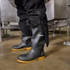 The EnduraMax Processing Boot features a non-slip outsole for stability and an ASTM-rated steel safety toe for protection.