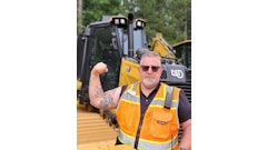 Michael Bastin, a Caterpillar employees, has a Cat-inspired tattoo.