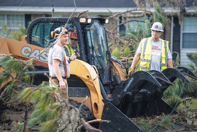 “Greyshirt” volunteers from Team Rubicon rely on loaned and donated equipment from CASE essential to clearing debris and opening roadways in disaster-stricken communities.