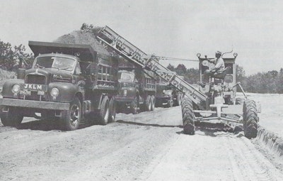 One advantage of a motor grader/EGA outfit was that it required only one operator. But in some loading situations, a spotter rode out on the parent’s frame to direct hauler traffic, somewhat negating the labor savings. Courtesy: Ulrich Manufacturing Company Form 1231, n. d., HCEA Archives