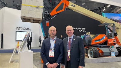 At CES 2025, Oshkosh CEO John Pfeifer (at left) and Rep. John Rose (Tenn. 6th Congressional District, at right). Tennessee is home of key growth manufacturing facilities for Oshkosh.