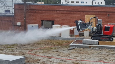 Controlling a water jet through mechanical means was a safer, faster, more sophisticated way to remove concrete compared to a jackhammer or hand lance.