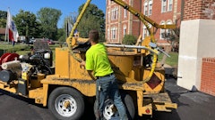 Pave Care employee Christian Shaffer crack sealing for a paving project at Eire Veterans Home.