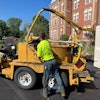 Pave Care employee Christian Shaffer crack sealing for a paving project at Eire Veterans Home.