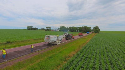 Roadbuilders use surveying equipment like Topcon Positioning systems to record varying slopes quickly.