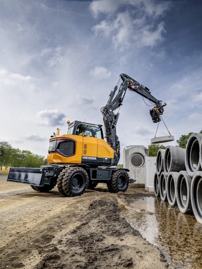 Hyundai Hw100 A Wheeled Excavator Lifting With Boom