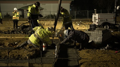Placing the footings.