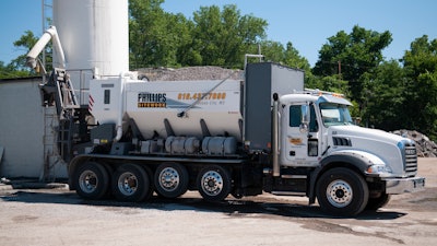 Phillips Sitework uses a Cemen Tech C60 volumetric mixer truck with automated technology of the ACCU-POUR fleet management software.