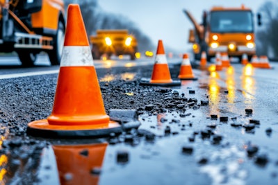 Dina Row Of Bright Orange Traffic Cones