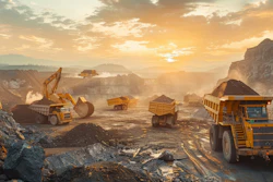 павел озарчук Dump Trucks Filling Up With Overburden And Dragline In Dusty Open Cut Coal Mine