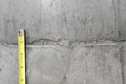 Joint edge spalling occurs when the joint filler is no longer protecting the joint edges and by rocking joints associated with slab curling that exposes edges to wheel impacts.