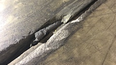 Concrete joint filler improperly filled over a backer rod.