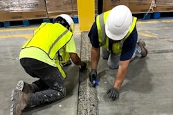 Concrete contractors widened a structural joint for repair.