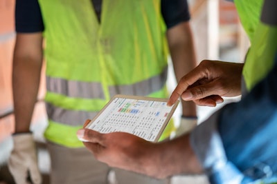 Construction Workers Using Outbuild Ipad (1)