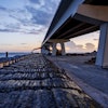 Gabion marine mattresses (25,225 square yards) await installation for scour protection.