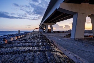 Gabion marine mattresses (25,225 square yards) await installation for scour protection.
