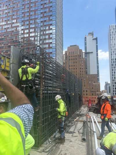 Construction of one of the 14th-floor post-tensioned transfer beams.