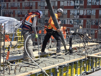 Pouring of the 14th-floor post-tensioned transfer beams.