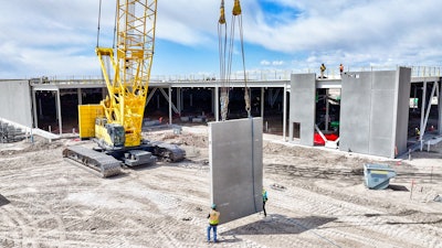 A crawler crane was selected for this large data center project for its mobility, lifting capacity, and efficiency in placing heavy prefabricated components across the expansive site.