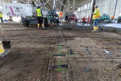 Tapered plate dowel baskets in sawcut contraction joints reduce restraint in slabs with two-directional doweling.