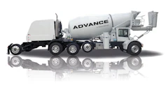White Advance concrete mixer truck with multiple axles on reflective surface
