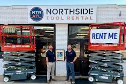 Three families coming back together. Josh Nickell (at right) and Cooper Douville (at left) celebrating the acquisition in their Buckhead branch, holding a picture of the Northside Tool Rental founder Roy Milling. Fun fact: Cooper and Josh's dad were coworkers and mentored by Roy.