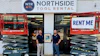 Three families coming back together. Josh Nickell (at right) and Cooper Douville (at left) celebrating the acquisition in their Buckhead branch, holding a picture of the Northside Tool Rental founder Roy Milling. Fun fact: Cooper and Josh's dad were coworkers and mentored by Roy.