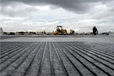 Grooves on a runway increase friction and reduce the risk of hydroplaning.