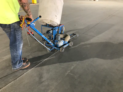 Timely saw cutting creates controlled planes of weakness that help manage shrinkage cracking and prevent random cracks from developing across the slab.