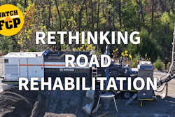 Road rehabilitation equipment with asphalt paving machinery in forest setting, promoting rethinking road rehabilitation