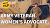 Army veteran and women's advocate in camouflage uniform standing before military vehicle