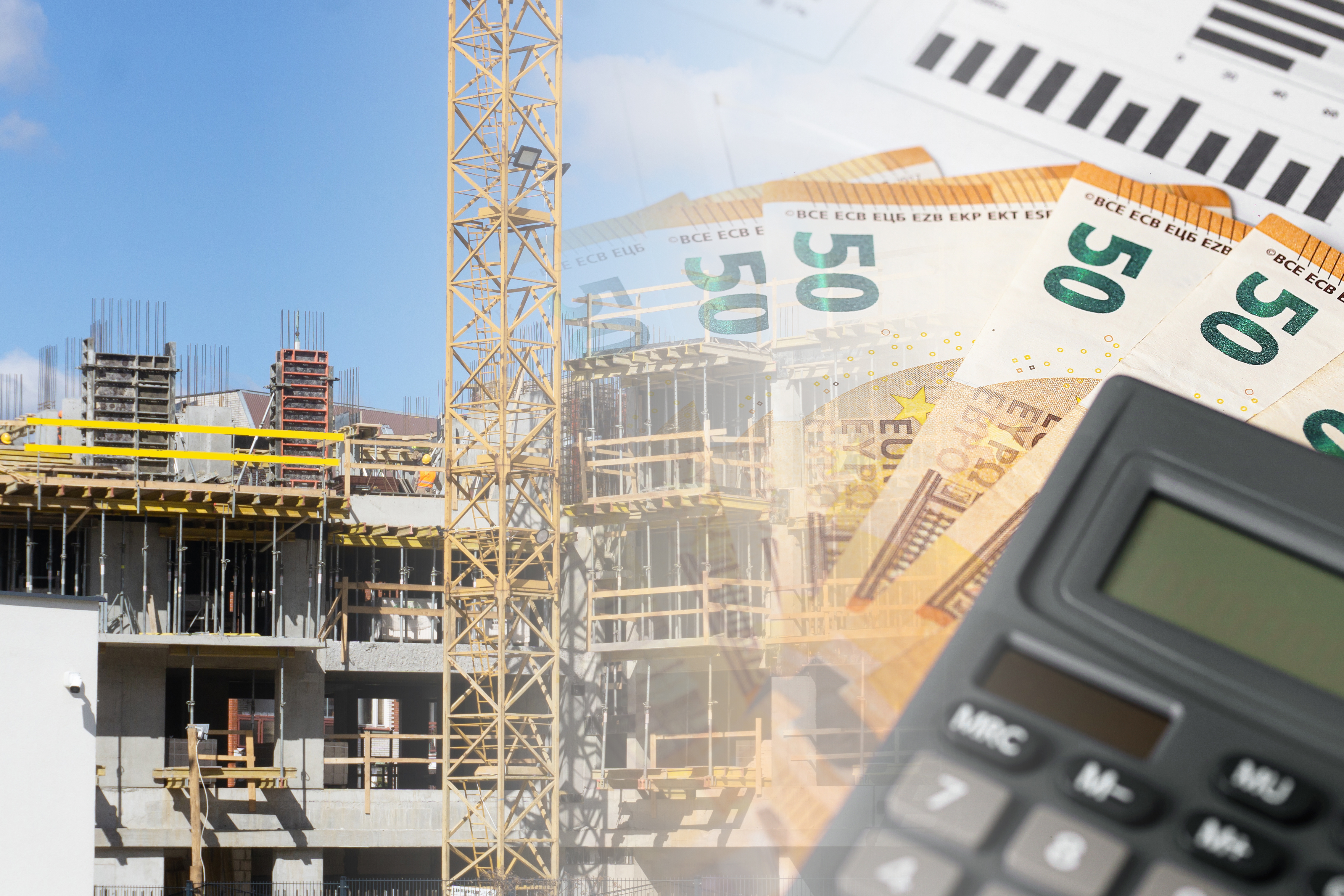Construction site with tower crane, building framework, Euro banknotes, calculator, and financial charts representing project budgeting