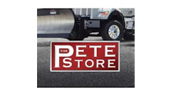 PETE Store red and white rectangular sign on pavement with delivery truck in background