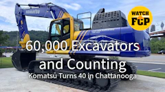 Komatsu excavator and branded truck celebrating 60,000 excavators milestone at 40th anniversary event in Chattanooga