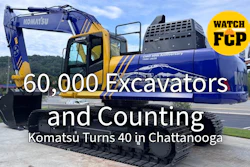 Komatsu excavator and branded truck celebrating 60,000 excavators milestone at 40th anniversary event in Chattanooga